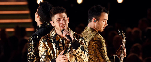 Real Talk: Why Didn't Anyone Tell Nick Jonas He Had Food in His Teeth at the Grammys?