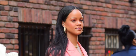 Rihanna Just Wore a Barbie Pink Suit With 1 Unexpected Accessory, and I'm Squealing!