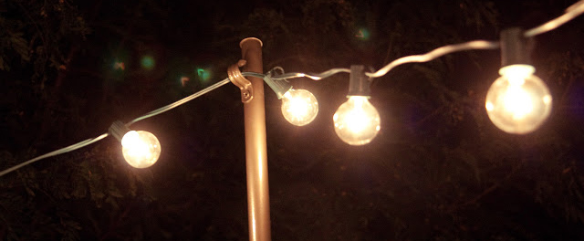 This Hack For Hanging Outdoor String Lights Will Make Your Summer